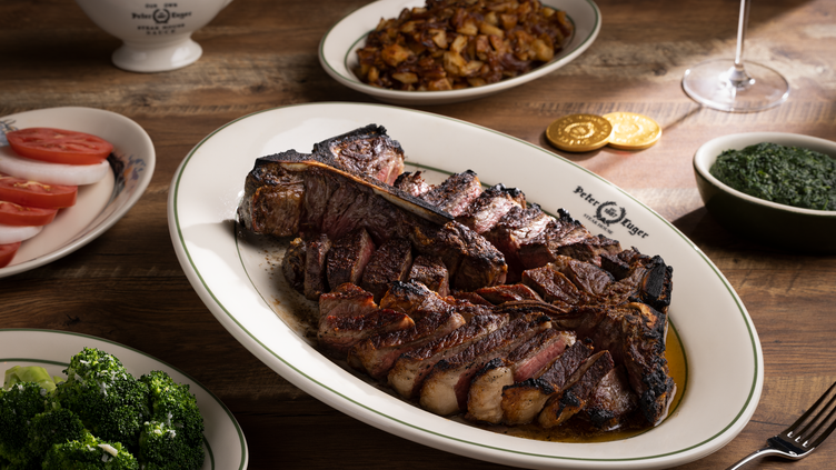 Peter Luger signature dishes Porterhouse Steak, Luger Burger, Creamed Spinach 